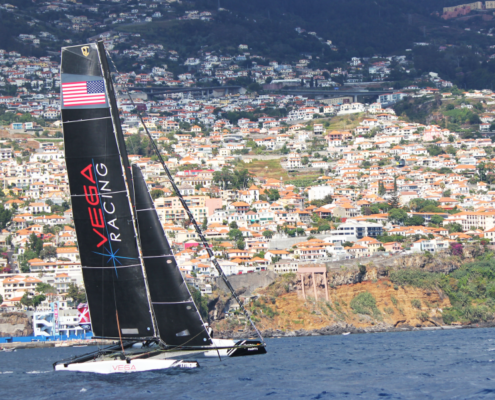 Vega Racing logo on sailboat