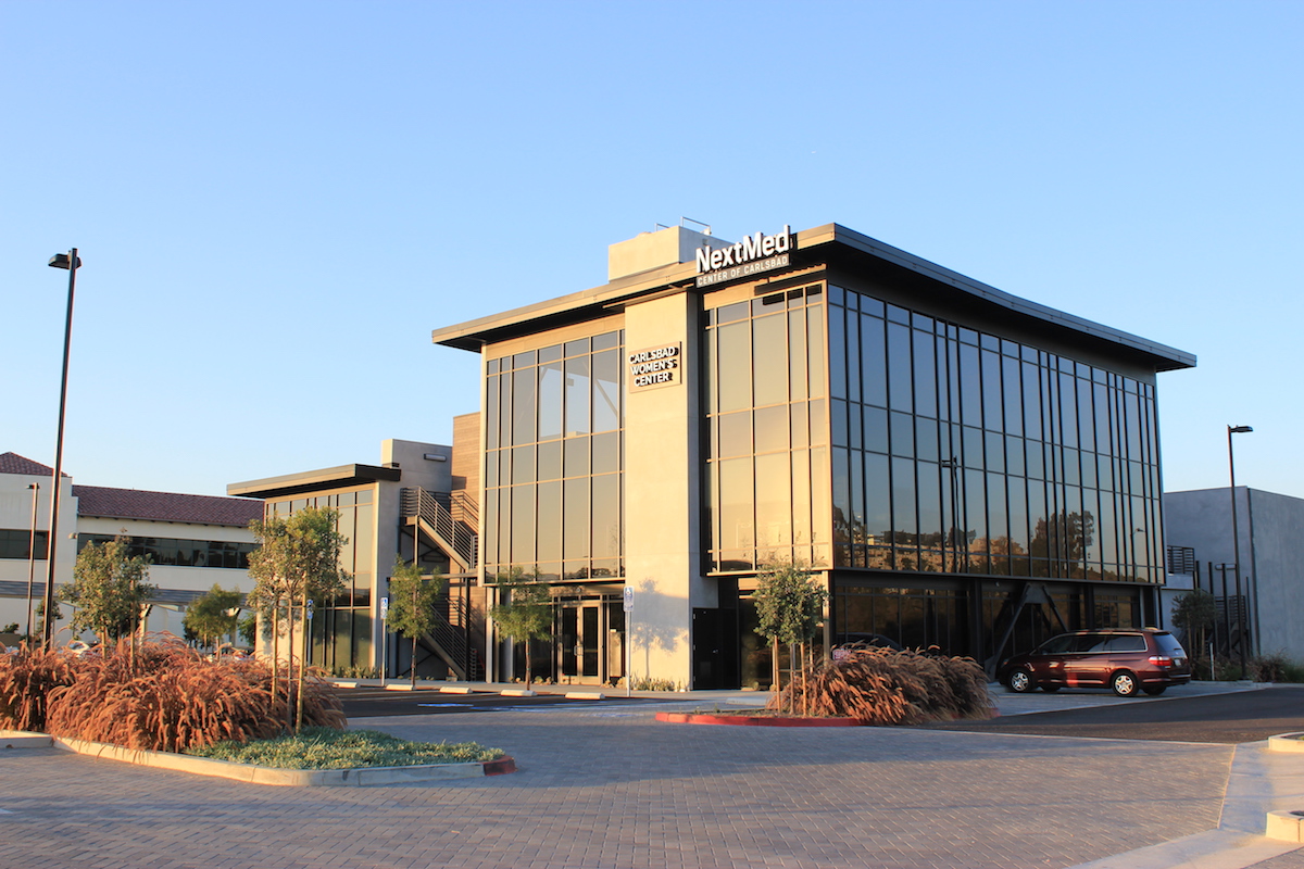 NextMed sign on outside of building