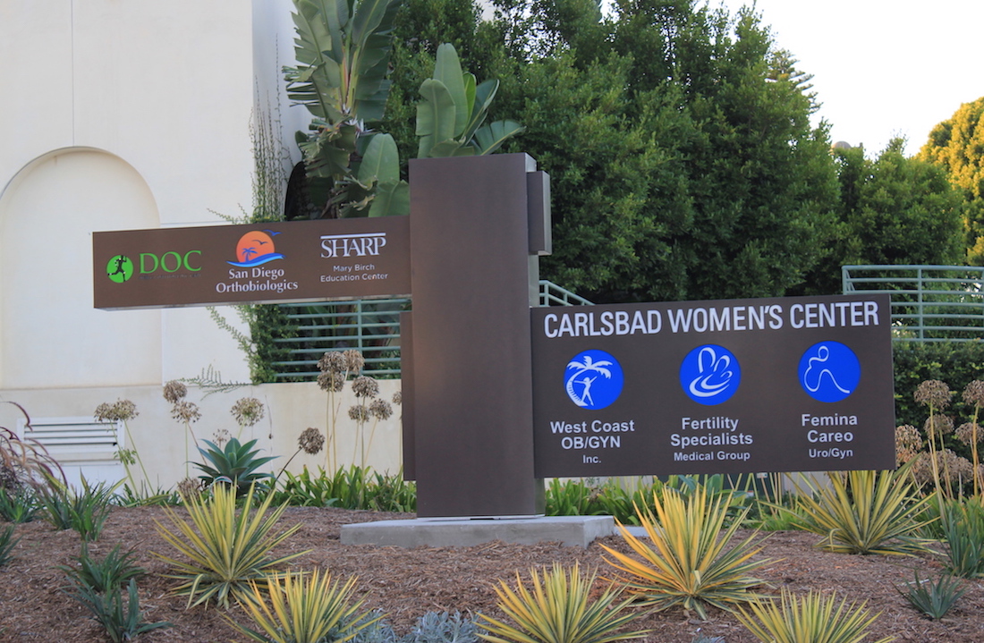 branded images on outdoor post